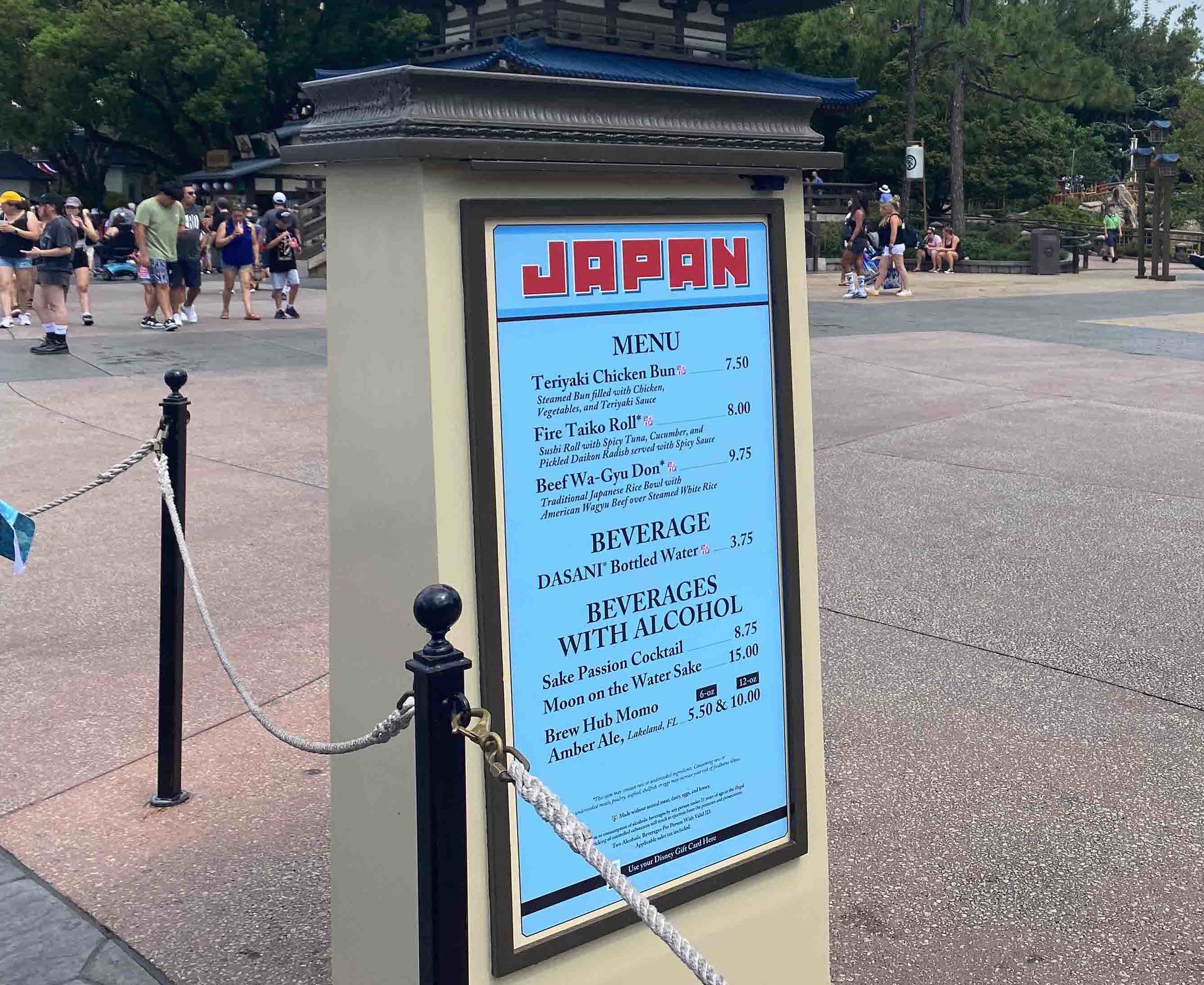 japan pavilion menu with red text and light blue background